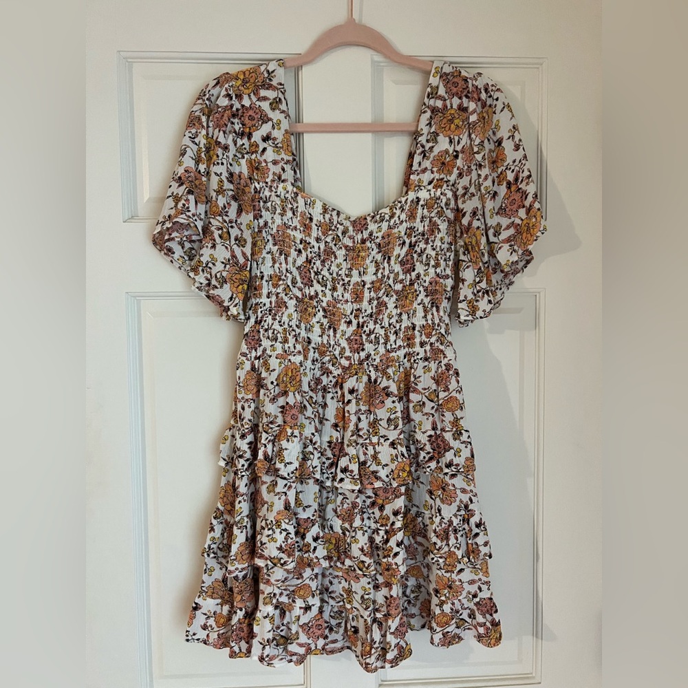 Chelsea and Violet dress. Ruffled/tiered skirt. Smocked waist. Cute!